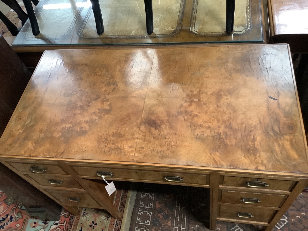 A mid 20th century Heals walnut kneehole desk, width 106cm depth 55cm height 78cm